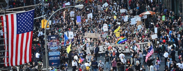 Occupy Wall Street participants stage a march down Broadway as part of May Day celebrations in New York, May 01, 2012. AFP PHOTO/Emmanuel Dunand (Photo credit should read EMMANUEL DUNAND/AFP/GettyImages)