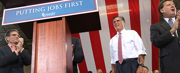 LAS VEGAS, NV - MAY 29: Republican presidential candidate, former Massachusetts Gov. Mitt Romney (2-R) smiles as he is introduced during a campaign rally at Somers Furniture on May 29, 2012 in Las Vegas, Nevada. Mitt Romney is holding campaign event and attending a fundraiser hosted by Donald Trump in Las Vegas. (Photo by Justin Sullivan/Getty Images)