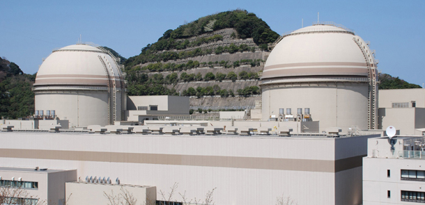 This picture taken on April 12, 2012 shows the third (R) and fourth reactor building of the Ohi nuclear power plant of the Kansai Electric Power Co (KEPCO) at Ohi town in Fukui prefecture, western Japan. Japanese Economy, Trade and Industry Minister Yukio Edano announced the government confirmed as safe plans to restart two offline reactors, preventing the country from idling all of its nuclear plants in the wake of last year's nuclear disaster at the prime ministrer's official residence after a meeting with Prime Minister Yoshihiko Noda on April 13, 0212. AFP PHOTO / JIJI PRESS JAPAN OUT (Photo credit should read JIJI PRESS/AFP/Getty Images)