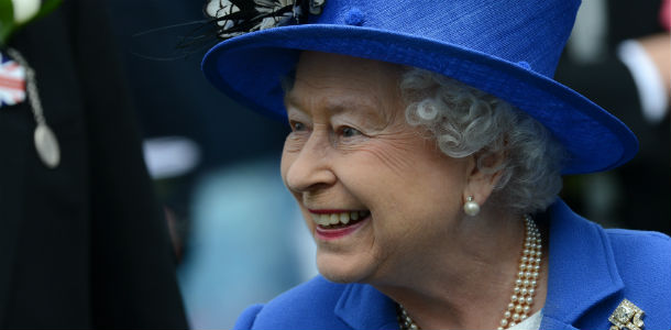 Britain's Queen Elizabeth II smiles as she talks to a racegoer at the parade ring before the Diamond Jubilee Coronation Cup on Derby Day, the second day of the Epsom Derby horse racing festival, at Epsom in Surrey, southern England, on June 2, 2012 the first official day of Britain's Queen Elizabeth II's Diamond Jubilee celebrations. AFP PHOTO / ADRIAN DENNIS (Photo credit should read ADRIAN DENNIS/AFP/GettyImages)