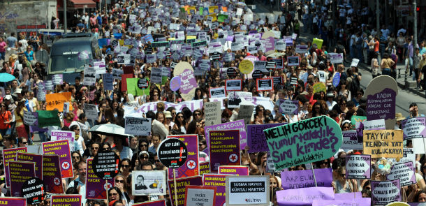 Thousands of Turkish women hold placards as they protest against Turkish Prime Minister, at Kadikoy in Istanbul on June 3, 2012. Turkey's Prime Minister Recep Tayyip Erdogan said on May 25 he considered abortion as 'murder.' 'I am a prime minister who is against Caesarean births. I consider abortion as murder,' Erdogan was quoted as saying by the Anatolia news agency. In Turkey, abortion is legal during the first 10 weeks of pregrancy. The woman's consent is required but if the woman is married, the husband's consent is also required. AFP PHOTO / BULENT KILIC (Photo credit should read BULENT KILIC/AFP/GettyImages)