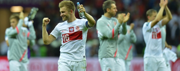 Polish midfielder Jakub Blaszczykowski celebrates at the end of the Euro 2012 championships football match Poland vs Russia on June 12, 2012 at the National Stadium in Warsaw. The match ended in a 1-1 draw. AFP PHOTO / NATALIA KOLESNIKOVA (Photo credit should read NATALIA KOLESNIKOVA/AFP/GettyImages)