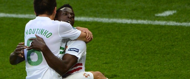 Portuguese forward Silvestre Varela (R) celebrates with Portuguese midfielder Joao Moutinho after scoring during the Euro 2012 championships football match Denmark vs Portugal on June 13, 2012 at the Arena Lviv. AFP PHOTO / ANNE-CHRISTINE POUJOULAT (Photo credit should read ANNE-CHRISTINE POUJOULAT/AFP/GettyImages)