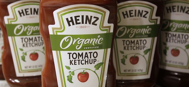 FILE - In this Aug. 19, 2009 file photo, Heinz Organic Tomato Ketchup bottles sit on the shelf of the Heinen's grocery store in Bainbridge Twp., Ohio. H.J. Heinz Co. said Tuesday, Nov. 24, 2009, its second-quarter profit dropped 16 percent from last year as the company's results were hurt by currency shifts. (AP Photo/Amy Sancetta, file)