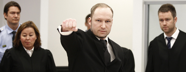 Accused Norwegian Anders Behring Breivik gestures between his defence team Vibeke Hein Baera, left, and Odd Ivar Groen, at the courtroom, in Oslo, Norway, Wednesday April 18, 2012. Breivik has five days to explain why he detonated a bomb outside government headquarters in Oslo, killing eight people, then drove to a nearby resort island, where he massacred 69 others at a summer youth camp run by the governing Labor Party. (AP Photo/Lise Aserud/Scanpix Norway/POOL)
