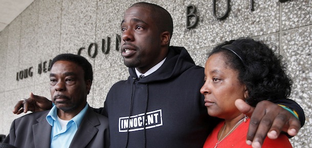 Brian Banks, center, reacts with his mother, Leomia Myers and father, Jonathan Banks, outside court after his rape conviction was dismissed Thursday May 24, 2012 in Long Beach, Calif. Banks, a former Long Beach high school football star and prized college recruit who served more than five years in prison for a rape he did not commit had his conviction overturned Thursday with his accuser recanting her story( AP Photo/Nick Ut)