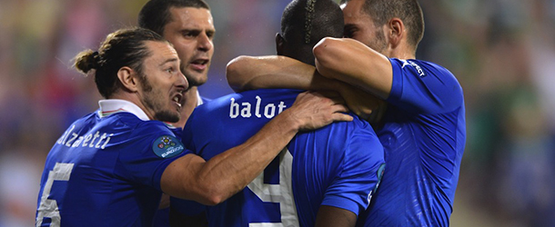 Italian forward Mario Balotelli (C) celebrates with teammates after scoring during the Euro 2012 football championships match Italy vs Republic of Ireland on June 18, 2012 at the Municipal Stadium in Poznan. AFP PHOTO / FABRICE COFFRINI (Photo credit should read FABRICE COFFRINI/AFP/GettyImages)