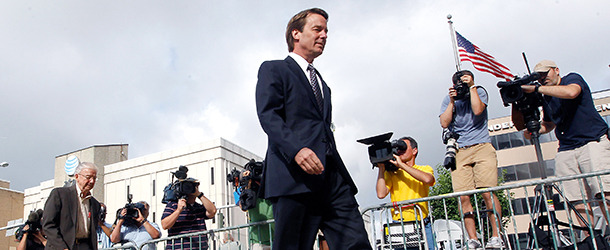 GREENSBORO, NC - MAY 29: Former U.S. Sen. John Edwards arrives with his father Wallace Edwards for the seventh day of jury deliberations at federal court May 29, 2012 in Greensboro, North Carolina. Edwards, a former presidential candidate, plead not guilty to six counts of campaign finance violations and could face a maximum of 30 years in jail and $1.5 million in fines. (Photo by Sara D. Davis/Getty Images)