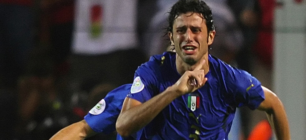 Dortmund, GERMANY: Italian defender Fabio Grosso celebrates his goal in extra time during the semi-final World Cup football match between Germany and Italy at Dortmund's stadium, 04 July 2006. Italy won the match 2-0 in extra time to reach the final. AFP PHOTO / PATRIK STOLLARZ (Photo credit should read PATRIK STOLLARZ/AFP/Getty Images)