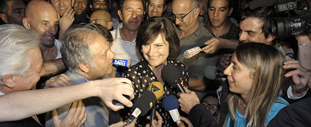 Marie-Arlette Carlotti (C), French Junior Minister for Disabled People and Socialist Party (PS) candidate in the 5th constituency of Bouches-du-Rhone for the French parliamentary elections, celebrates after she won in the second round on June 17, 2012 in Marseille, southern France. France's Socialists won control of parliament in a run-off vote today, handing President Francois Hollande the convincing majority needed to push through a tough tax-and-spend agenda, estimates said. AFP PHOTO FRANCK PENNANT (Photo credit should read FRANCK PENNANT/AFP/GettyImages)