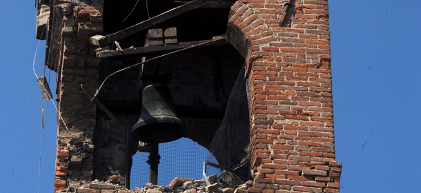 NOVI DI MODENA, ITALY - MAY 30: The clock tower of Novi di Modena damaged by the earthquake on May 30, 2012 in Novi di Modena, Italy. Following a second series of strong earthquakes across the Emilia-Romagna region yesterday the death toll has risen to 17 people with more than 15,000 displaced. A further 50 aftershocks were felt during the night, the strongest of which measured 3.54 on the richter scale. (Photo by Roberto Serra/Iguana Press/Getty Images)
