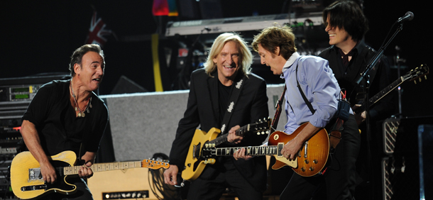 Sir Paul McCartney (2nd R) jams with Bruce Springsteen (L) performs at the end of the 54th Grammy Awards at the Staples Center in Los Angeles, California, February 12, 2012. AFP PHOTO Robyn BECK (Photo credit should read ROBYN BECK/AFP/Getty Images)