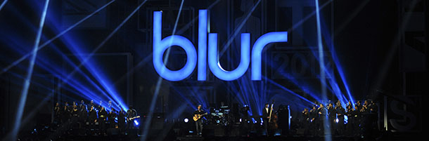 Damon Albarn, Graham Coxon, Dave Rowntree and Alex James of British alternative rock band Blur perform live on stage at the end of the BRIT Awards 2012 in London on February 21, 2012. AFP PHOTO / LEON NEAL (Photo credit should read LEON NEAL/AFP/Getty Images)