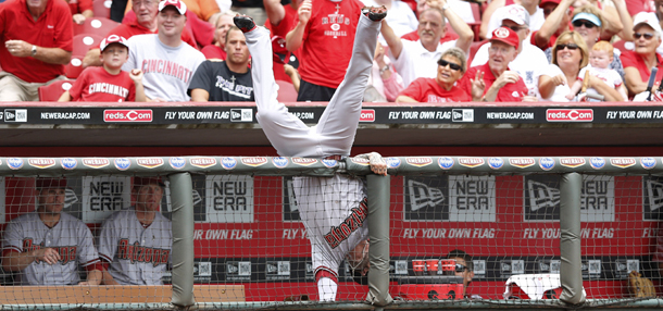 CINCINNATI, OH - JULY 19: Ryan Roberts #14 of the Arizona Diamondbacks flips over the dugout rail trying to catch a foul ball during the game against the Cincinnati Reds at Great American Ball Park on July 19, 2012 in Cincinnati, Ohio. (Photo by Joe Robbins/Getty Images)