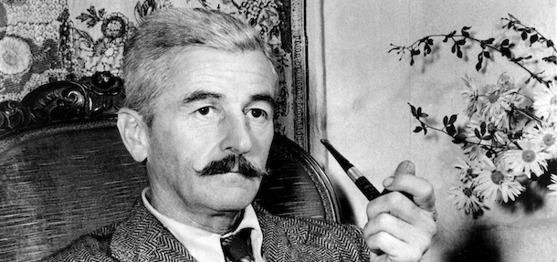 **FILE**American novelist William Faulkner at his home in Rowan Oaks near Oxford, Miss., in 1950. The Center for Faulkner Studies at Southeast Missouri State University has added hundreds of pages of government documents to its collection of papers about the Nobel Prize-winning author. The center has acquired copies of about 400 pages of U.S. State Department records that relate to William Faulkner's visits to eight foreign countries during the 1950s, including Japan, Greece, Italy, France and Venezuela. (AP Photo,File)