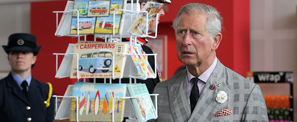 TRURO, ENGLAND - JULY 02: Prince Charles, Prince of Wales looks at postcards during a visit to Heartlands Community Regeneration Project on July 2, 2012 in Truro, England. Prince Charles, Prince of Wales and Camilla, Duchess of Cornwall are on a three day trip to Cornwall and the Isles of Scilly. The Prince of Wales is celebrating 60 years as the Duke of Cornwall. (Photo by Chris Jackson/Getty Images)