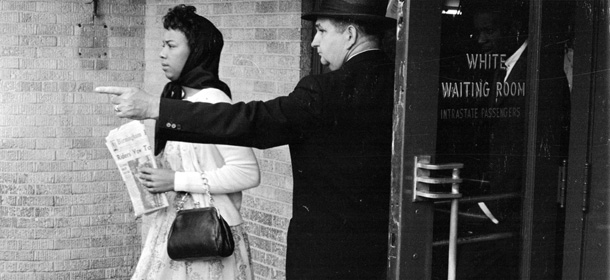 25th May 1961: A black woman is directed away from the 'white waiting room' at Jackson, Mississippi. She has arrived on the 'Freedom Bus' to protest against the racial segregation of passengers on the nation's buses. (Photo by William Lovelace/Express/Getty Images)