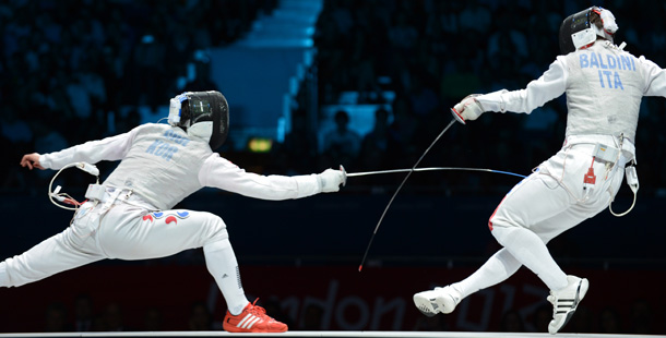 Italy's Andrea Baldini (R) fences against South Korea's Choi Byungchul during their Men's foil bronze medal bout as part of the fencing event of London 2012 Olympic games, on July 31, 2012 at the ExCel centre in London. AFP PHOTO / TOSHIFUMI KITAMURA (Photo credit should read TOSHIFUMI KITAMURA/AFP/GettyImages)