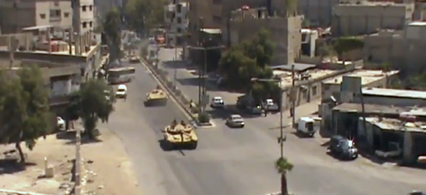 This image made from video provided by Shaam News Network Tuesday, July 17, 2012, purports to show Syrian tanks in Damascus, Syria. (AP Photo/Shaam News Network via AP video) THE ASSOCIATED PRESS HAS NO WAY OF INDEPENDENTLY VERIFYING THE CONTENT, LOCATION OR DATE OF THIS PICTURE.