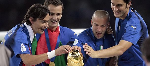 Berlin, GERMANY: (From L) Italian forward Filippo Inzaghi, Italian forward Alberto Gilardino, Italian forward Alessandro Del Piero, and Italian forward Luca Toni celebrate with the trophy after the World Cup 2006 final football game Italy vs.France, 09 July 2006 at Berlin stadium. Italy won the 2006 football World Cup by defeating France on penalties. AFP PHOTO PASCAL PAVANI (Photo credit should read PASCAL PAVANI/AFP/Getty Images)