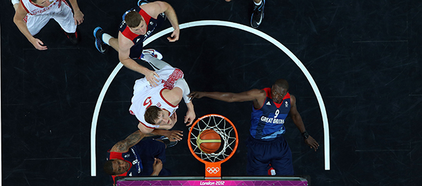 LONDON, ENGLAND - JULY 29: Luol Deng #9 of Great Britain falls as a basket is made against Russia during their Men's Basketball Game on Day 2 of the London 2012 Olympic Games at the Basketball Arena on July 29, 2012 in London, England. (Photo by Rob Carr/Getty Images)