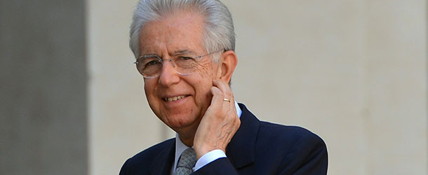 Italian Prime Minister Mario Monti waits for the arrival of Palestinian president Mahmud Abbas at the Palazzo Chigi in Rome on July 17, 2012. AFP PHOTO / GABRIEL BOUYS (Photo credit should read GABRIEL BOUYS/AFP/GettyImages)