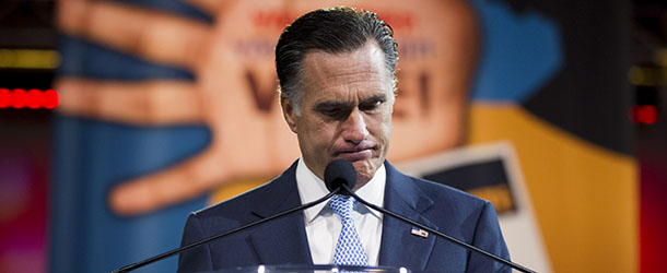 Republican presidential candidate, former Massachusetts Gov. Mitt Romney pauses during a speech before the NAACP annual convention, Wednesday, July 11, 2012, in Houston, Texas. (AP Photo/Evan Vucci)