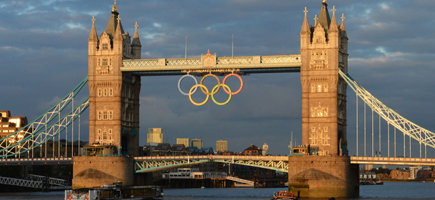 A general view of the Tower Bridge decorated with the Olympic ring symbol, in central London, on July 15, 2012, as Britain prepares for the beginning of the Olympic Games. The London 2012 Olympic Games will begin on July 27, 2012. AFP PHOTO/MIGUEL MEDINA (Photo credit should read MIGUEL MEDINA/AFP/GettyImages)