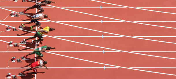 LONDON, ENGLAND - AUGUST 04: James Dasaolu of Great Britain (lane 6) and Usain Bolt of Jamaica (lane 7) starts in the Men's 400m Round 1 Heats on Day 8 of the London 2012 Olympic Games at Olympic Stadium on August 4, 2012 in London, England. (Photo by Ian Walton/Getty Images)