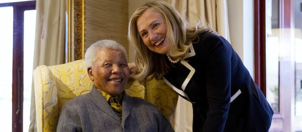 Secretary of State Hillary Rodham Clinton meets with former South Africa President Nelson Mandela, 94, at his home in Qunu, South Africa, Monday, Aug. 6, 2012. (AP Photo/Jacquelyn Martin, Pool)