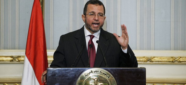 Egyptian Prime Minister Hisham Qandil gestures as he gives a press conference announcing the new cabinet on August 2, 2012, at the Prime Minister's office in Cairo. Qandil unveiled the new cabinet that retained military chief Field Marshal Hussein Tantawi as defence minister while giving the ruling Islamists and their allies several portfolios. AFP PHOTO/GIANLUIGI GUERCIA (Photo credit should read GIANLUIGI GUERCIA/AFP/GettyImages)