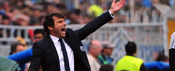 Juventus' coach Antonio Conte gestures during the seria A match Novara against Juventus on April 29, 2012, at the Novara stadium. AFP PHOTO / OLIVIER MORIN (Photo credit should read OLIVIER MORIN/AFP/GettyImages)