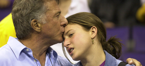 Actor Dustin Hoffman kisses his daughter, Ali, in Staples Center before the start of Game 2 of the NBA Finals between the Los Angeles Lakers and the New Jersey Nets Thursday, June 7, 2002, in Los Angeles. (AP Photo/Paul Sakuma)