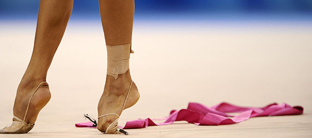 Russia's Evgeniya Kanaeva competes in the individual all-around qualification of the rhythmic gymnastics at the Beijing 2008 Olympic Games in Beijing on August 22, 2008. AFP PHOTO / FRANCK FIFE (Photo credit should read FRANCK FIFE/AFP/Getty Images)