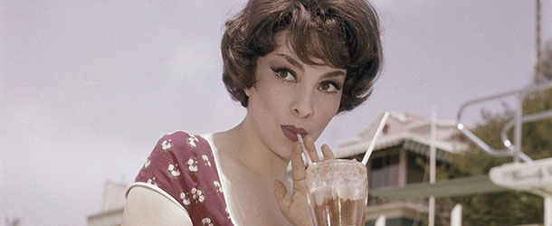 Actress Gina Lollobrigida during sits by the pool with a soda during her stay at the Beverly Hills hotel in Los Angeles, Calif. on May 10, 1959. (AP Photo)