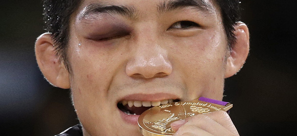 Kim Hyeon-woo, sudcoreano, vincitore della medaglia d'oro nella lotta greco-romana 66 kg (AP Photo/Paul Sancya)