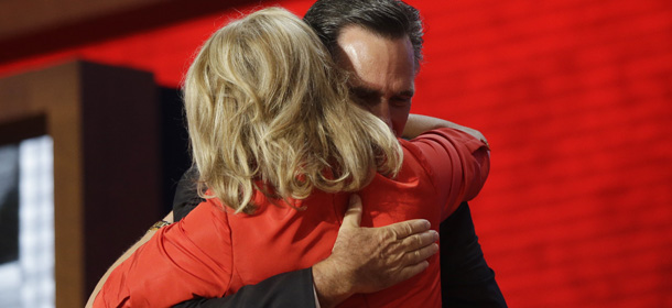 Republican presidential nominee Mitt Romney hugs his wife Ann Romney on stage at the Republican National Convention in Tampa, Fla. on Tuesday, Aug. 28, 2012. (AP Photo/Charles Dharapak)
