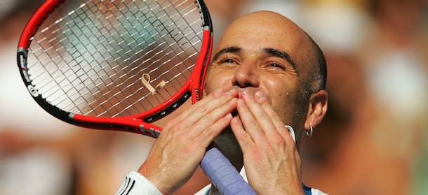 WESTWOOD, CA &#8211; JULY 30: Andre Agassi blows a kiss into the crowd as he celebrates his 6-4, 6-2 win against Juan Ignacio Chela of Argentina during their semifinal mach on Day 6 of the Mercedes-Benz Cup July 30, 2005 in Straus Stadium at the Los Angeles Tennis Center-UCLA in Westwood, California. (Photo by Matthew Stockman/Getty Images)
