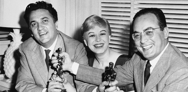 FILE &#8211; In this March 28, 1957 file photo, Federico Fellini, left, his wife Giulietta Masina, and Dino De Laurentiis hold the Oscars awarded for &#8220;La Strada&#8221; in the Hollywood section of Los Angeles, Calif. De Laurentiis, a film impresario and producer of &#8220;Serpico,&#8221; &#8220;Barbarella&#8221; and &#8220;Death Wish,&#8221; died Wednesday, Nov. 10, 2010 at his home in Beverly Hills, Calif. He was 91. (AP Photo/ Ellis Bosworth, File)
