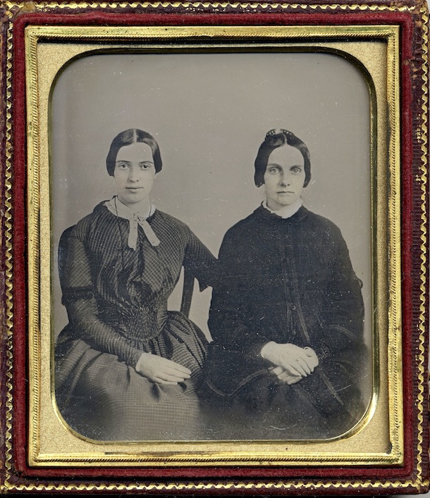 This photo released Friday, Sept. 7, 2012 by Amherst College Archives and Special Collections, and the Emily Dickinson Museum, in Amherst, Mass., shows a copy of a circa 1860 daguerreotype purported to show a 30-year-old Emily Dickinson, left, with her friend Kate Scott Turner. The image was displayed during the August, 2012 Emily Dickinson International Society conference held at at Case Western Reserve University in Cleveland. (AP Photo/Amherst College Archives and Special Collections, and the Emily Dickinson Museum)