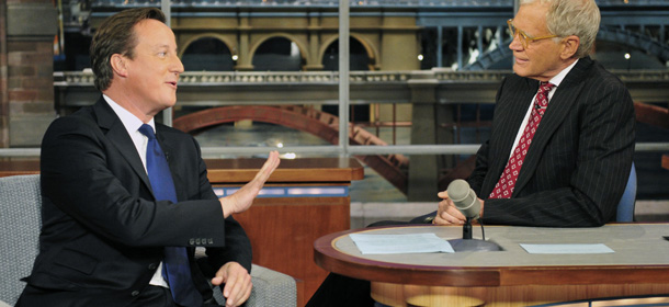 In this photo provided by CBS, British Prime Minister David Cameron, left, talks with host David Letterman on the set of the Ã¬Late Show with David Letterman,Ã® Wednesday, Sept. 26, 2012 in New York. (AP Photo/CBS, John Paul Filo) MANDATORY CREDIT; NO ARCHIVE; NO SALES
