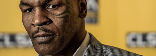 US boxer and former heavyweight world champion Mike Tyson addresses a press conference in Hong Kong on September 12, 2012. Tyson is in Hong Kong to attend the annual CLSA investor forum. AFP PHOTO / Philippe Lopez (Photo credit should read PHILIPPE LOPEZ/AFP/GettyImages)
