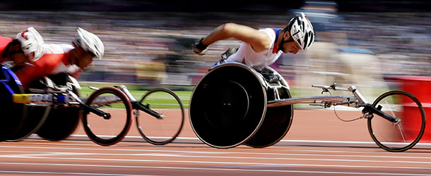 France's Julien Casoli, right, competes in a men's 1500 T54 event at the 2012 Paralympics, Monday, Sept. 3, 2012, in London. (AP Photo/Kirsty Wigglesworth)