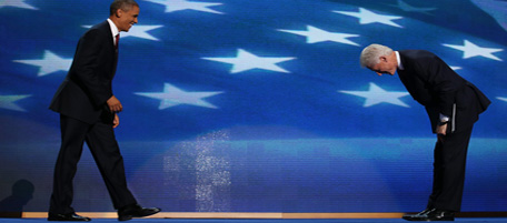 CHARLOTTE, NC - SEPTEMBER 05: Former U.S. President Bill Clinton greets Democratic presidential candidate, U.S. President Barack Obama (L) on stage during day two of the Democratic National Convention at Time Warner Cable Arena on September 5, 2012 in Charlotte, North Carolina. The DNC that will run through September 7, will nominate U.S. President Barack Obama as the Democratic presidential candidate. (Photo by Chip Somodevilla/Getty Images)