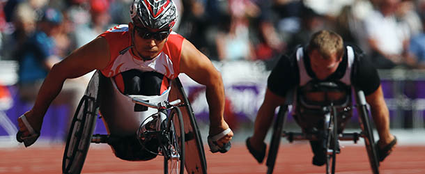 LONDON, ENGLAND - SEPTEMBER 07: Jun Hiromichi (L) of Japan competes in the Men's 200m Ã³ T53 heats on day 9 of the London 2012 Paralympic Games at Olympic Stadium on September 7, 2012 in London, England. (Photo by Dean Mouhtaropoulos/Getty Images)