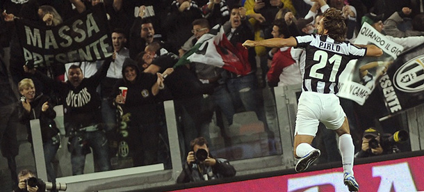 Juventus&#8217; Andrea Pirlo celebrates after he scored during a Serie A soccer match between Juventus and A.S. Roma at the Juventus Stadium in Turin, Italy, Saturday, Sept. 29, 2012. (AP Photo/Massimo Pinca)
