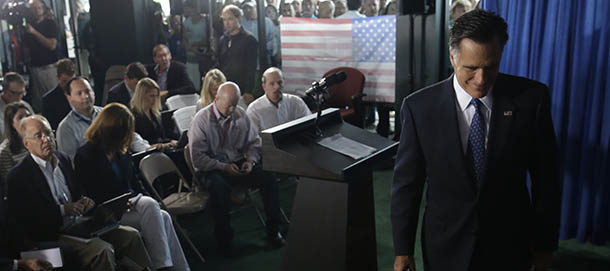 Republican presidential candidate and former Massachusetts Gov. Mitt Romney leaves the podium after he makes comments on the killing of U.S. embassy officials in Benghazi, Libya, while speaking in Jacksonville, Fla., Wednesday, Sept. 12, 2012. (AP Photo/Charles Dharapak)