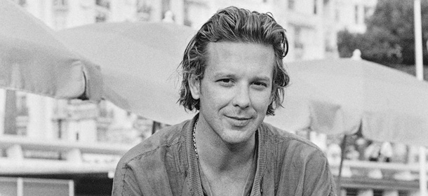 American movie star Mickey Rourke, relaxes on the beach, on the Croisette, in Cannes, France after world premiere of his film &#8220;Homeboy&#8221;, directed by Michael Seresin, August 20, 1988. (AP Photo/Gilbert Tourte)
