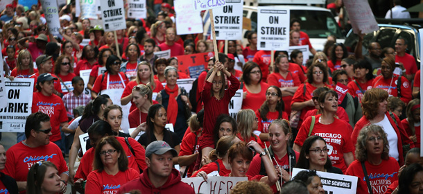 CHICAGO, IL - SEPTEMBER 10: Thousands of Chicago public school teachers and their supporters march through the Loop and in front of the Chicago Public Schools (CPS) headquarters on September 10, 2012 in Chicago, Illinois. More than 26,000 teachers and support staff hit the picket lines this morning after the Chicago Teachers Union failed to reach an agreement with the city on compensation, benefits and job security. With about 350,000 students, the Chicago school district is the third largest in the United States. (Photo by Scott Olson/Getty Images)