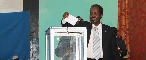 Somalia's newly elected President Hassan Sheikh Mohamud casts his own vote before winning a majority of votes in Mogadishu on September 10, 2012. Lawmakers chose Hassan Sheikh Mohamud as Somalia's new president after the 56-year-old lecturer got the majority of votes in a second round run-off, beating outgoing president Sharif Sheikh Ahmed. AFP PHOTO/Abdurashid Abdulle Abikar (Photo credit should read ABDURASHID ABDULLE ABIKAR/AFP/GettyImages)